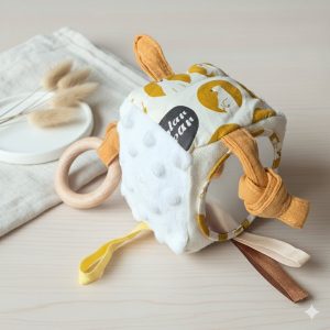 Activiteitenkubus van pluche (wit/oker)